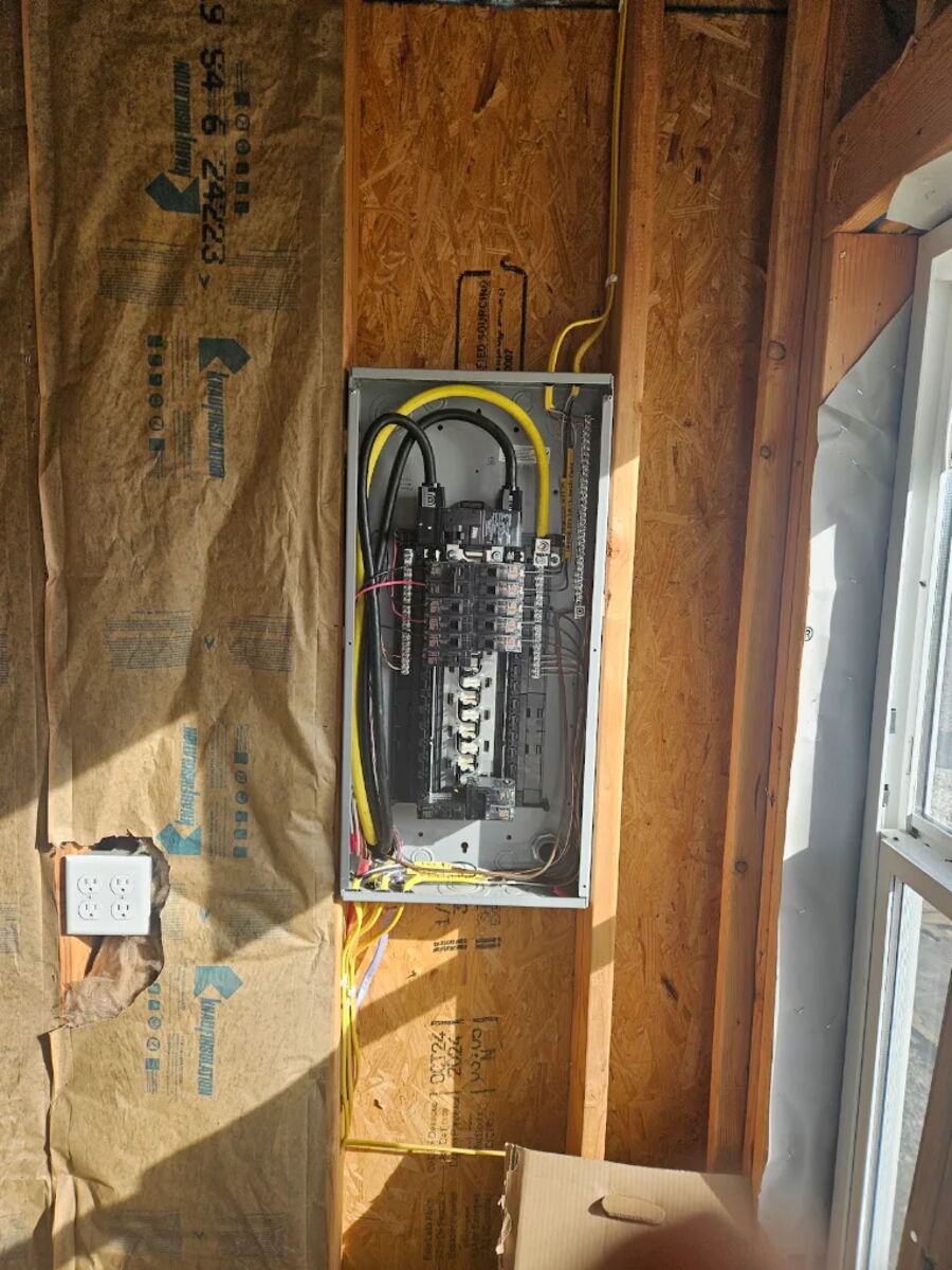 New Construction Wiring — New electrical panel and rough-in wiring in a new construction home by RP Electric