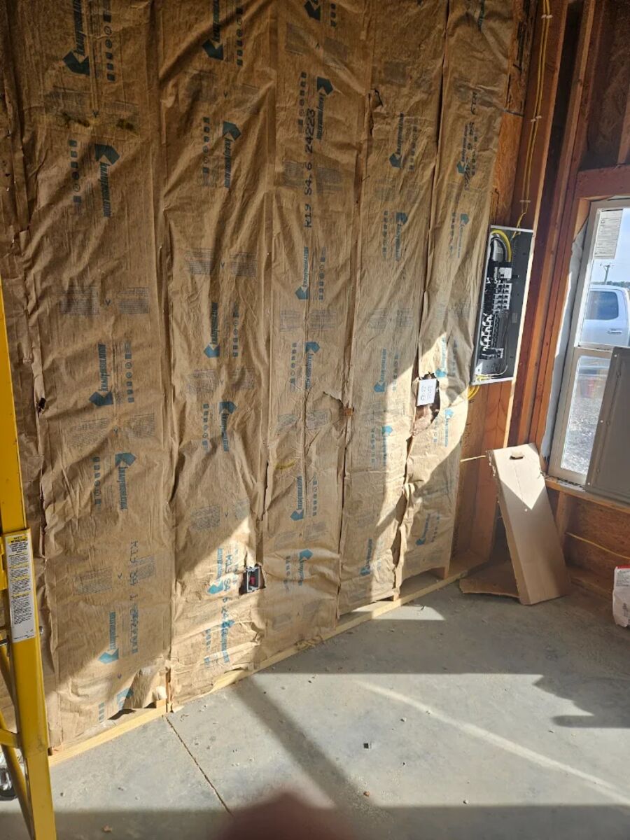 New construction wall rough-in with electrical boxes ready for inspection